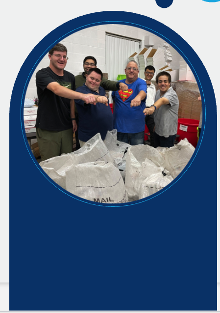 Team members packing orders, representing publishing with purpose