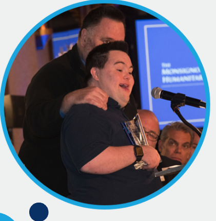 John receiving award